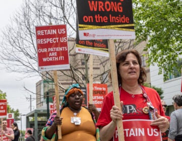 Nurses and union supporters picket outside St. Christopher’s Children’s Hospital with signs reading retain us respect us our patients are worth it, among others