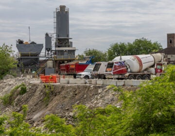 a look at a cliff on the edge of a cement company