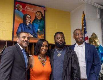 Philadelphia Superintendent Dr. Tony Watlington (left); retired teacher Joyce Abbott (center-left); painter Ivben Taqiy (center-right); and Andrew Hamilton School principal Torrence Rothmiller (right), in front of Taqiy’s portrait of Abbott, her mother and former student Quinta Brunson, who created the show 