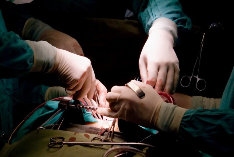 Hands of surgeons in operation room. (Bigstock/beerkoff)