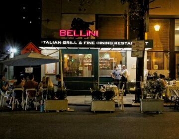 A restaurant on 16th Street in Center City uses the street for outdoor dining. (Emma Lee/WHYY)