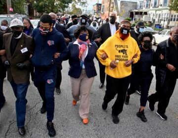 Community leaders and members of the clergy led a march Tuesday from the site where Walter Wallace Jr. was killed to the police precinct at 55th and Pine (Emma Lee/WHYY)