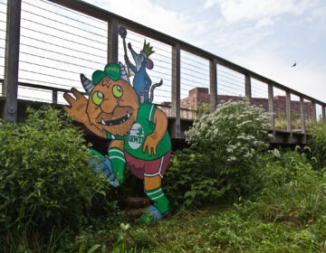 A troll by artist Kid Hazo under a footbridge at Philadelphia’s Navy Yard. (Kimberly Paynter/WHYY)