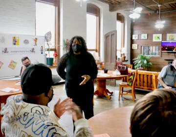 Former Philadelphia Poet Laureate Trapeta Mayson leads a poetry workshop at the Open Door Clubhouse in Kensington