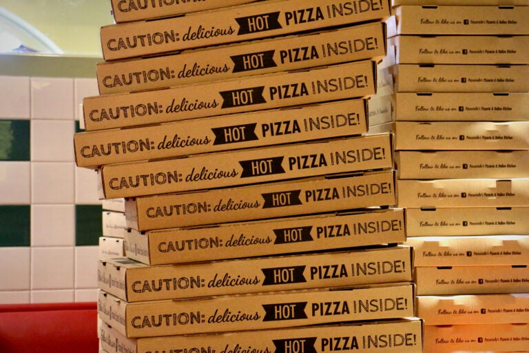 A stack of pizza boxes