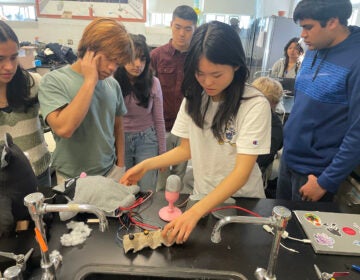 Some Princeton High School students working on of the prototypes they are developing for their entry in Samsung Electronics' Solve for Tomorrow competition