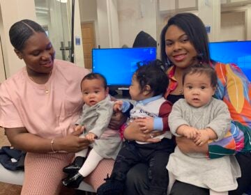 Paris and Briante Grant sit with their triplets