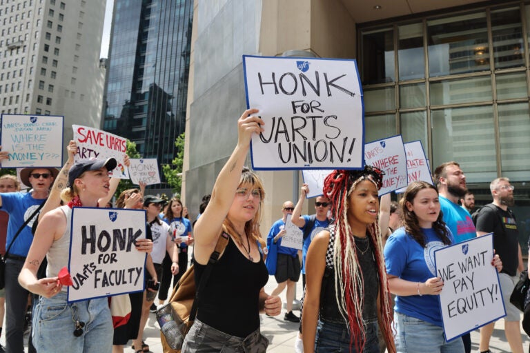 Students join faculty and staff of the University of the Arts at a rally