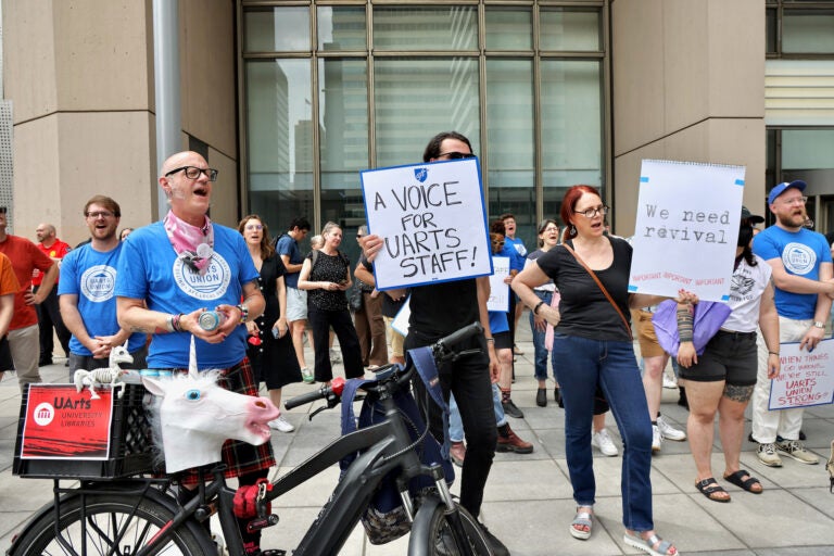 Faculty, students and staff gather outside the law offices of University of the Arts Board Chairman Judson Aaron at 1500 Market St.