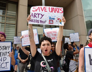 Students join faculty and staff of the University of the Arts at a rally