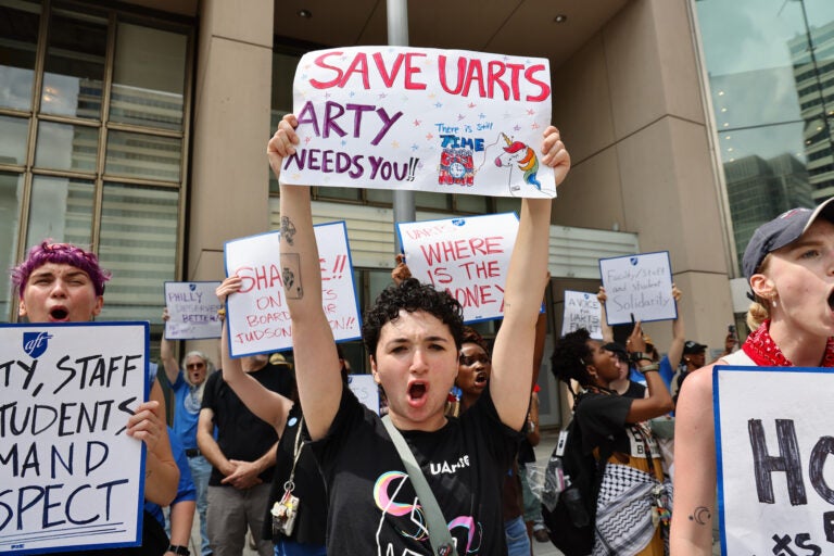 Students join faculty and staff of the University of the Arts at a rally