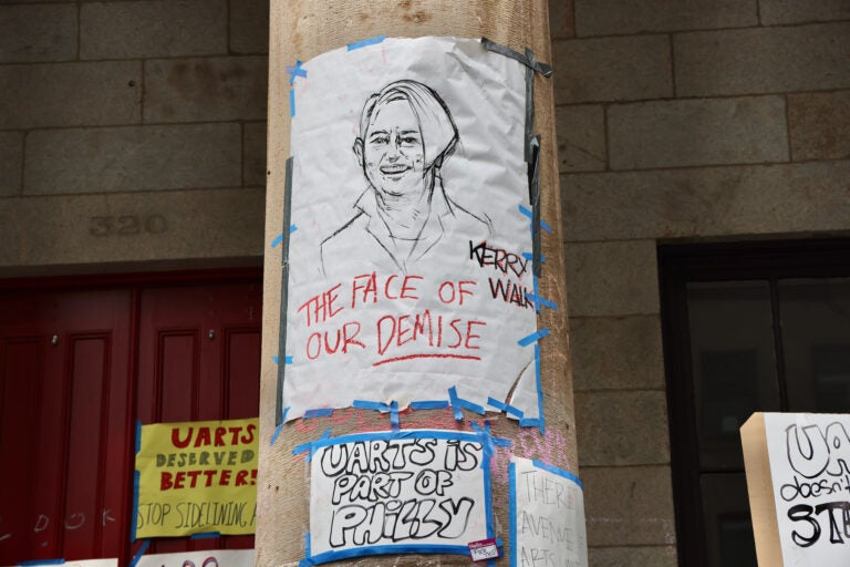 University of the Arts President Kerry Walk appears on a hand-drawn poster at Hamilton Hall with a caption reading The face of our demise