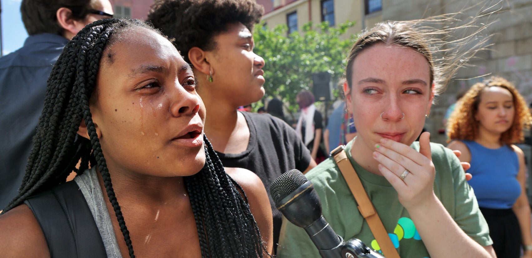 University of the Arts dance students Rebekah Palmer (left) and Kylie Price weep as the recount their experiences at UArts.