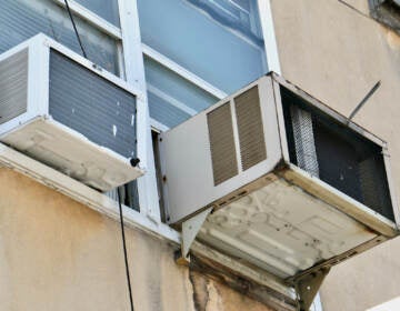 Window air conditioners in an building on Race Street