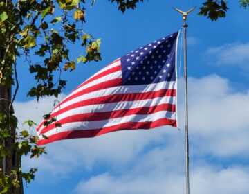 American flag flying on a sunny day