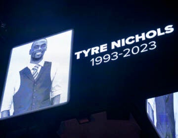 The screen at the Smoothie King Center in New Orleans honors Tyre Nichols before an NBA basketball game between the New Orleans Pelicans and the Washington Wizards, Jan. 28, 2023