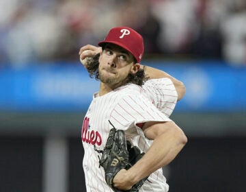 Philadelphia Phillies starting pitcher Aaron Nola throws against the Arizona Diamondbacks during the first inning in Game 2 of the baseball NL Championship Series in Philadelphia, Tuesday, Oct. 17, 2023