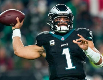 Philadelphia Eagles quarterback Jalen Hurts passes against the New York Giants during the second half of an NFL football game Monday, Dec. 25, 2023, in Philadelphia.