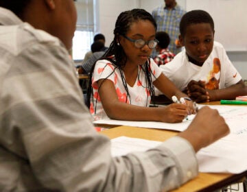 Shina Smith, 13, left, and Chris Douglass, 13, are two of 50 incoming students participating in Westlake High School's 