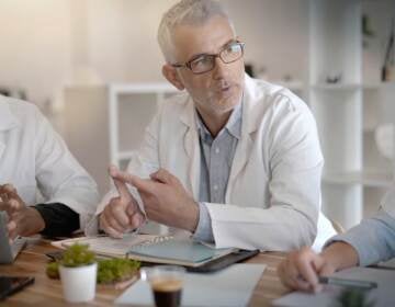 doctors on a work meeting in a meeting room in a hospital