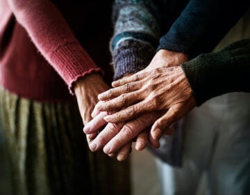 Closeup of hands of group of seniors