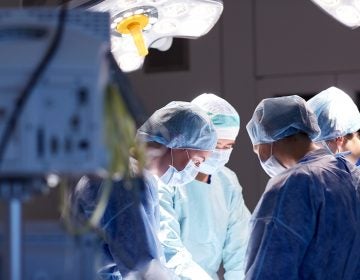 Surgeons at work during a surgery.