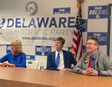 Bethany Hall-Long, Collin O'Mara and Matt Meyer sit at a table.