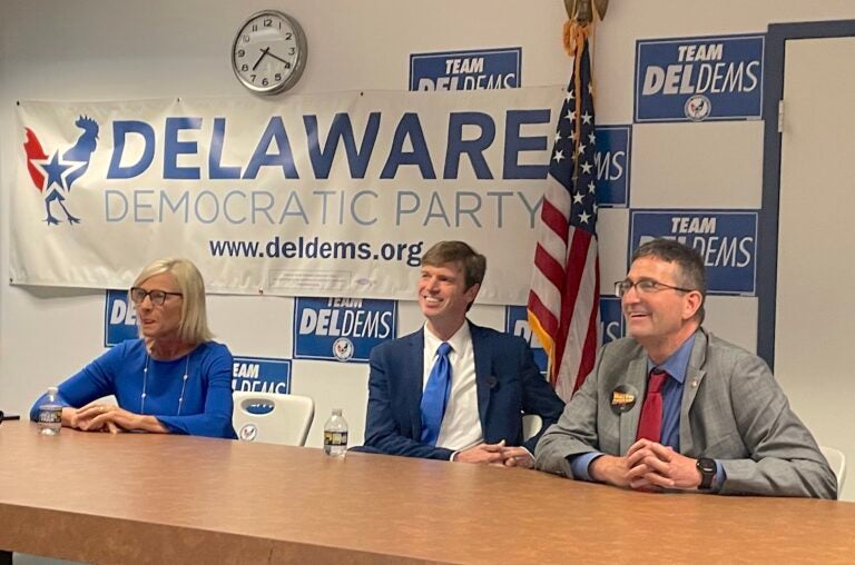 Bethany Hall-Long, Collin O'Mara and Matt Meyer sit at a table.