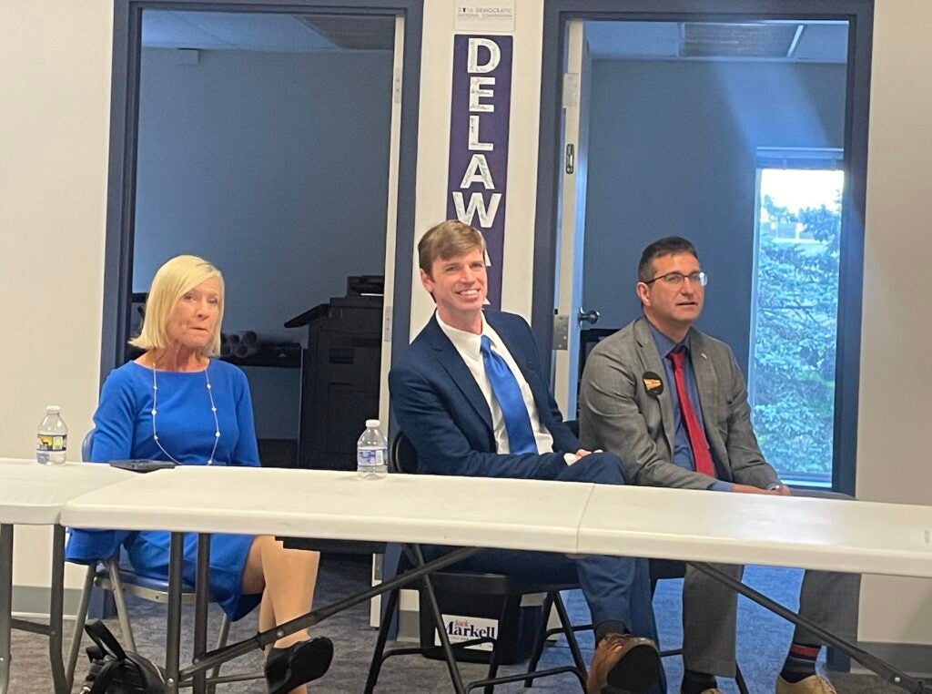 Bethany Hall-Long, Collin O'Mara and Matt Meyer sit at a table.