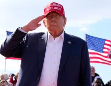 Republican presidential candidate former President Donald Trump salutes at a campaign rally March 16, 2024, in Vandalia, Ohio.