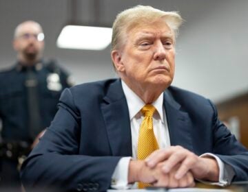 Former President Donald Trump sits in Manhattan criminal court, May 21, 2024, in New York.