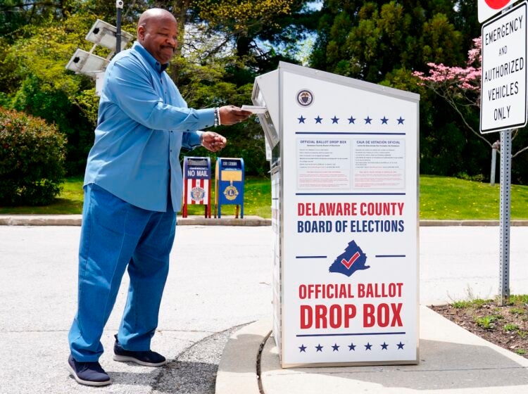 David Harrison drops off his mail ballot for the Pennsylvania primary election in Newtown Square, Pa., Monday, May 2, 2022.