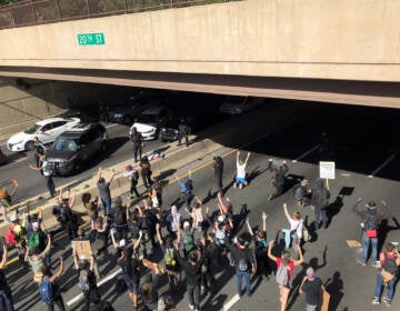 Protesters face off with police during a demonstration on I-676 in Philadelphia on June 1, 2020