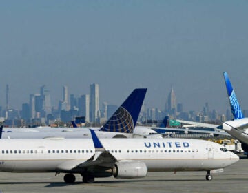 United Air Lines planes line up along the busy Newark Liberty International Airport, New Jersey, on the eve of Thanksgiving on November 23, 2022. Daniel Slim/AFP via Getty Images