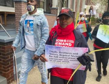 Treska Frisby, an organizer and survivor of gun violence, walks in Trenton's March For Peace on Palm Sunday