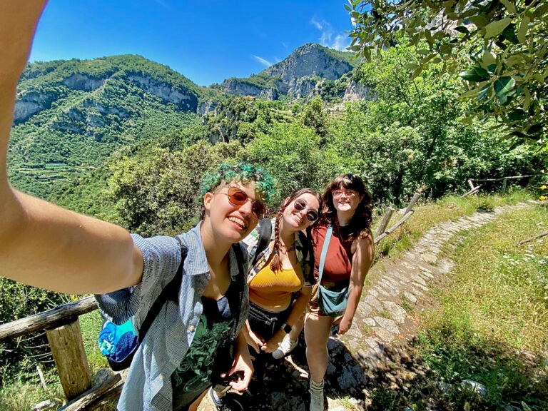 Students hiking on a path.