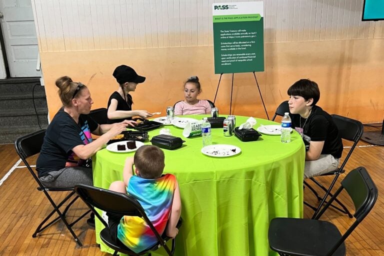 participants sit at a table