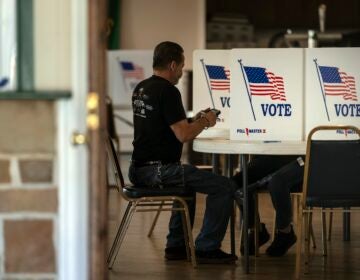 A voter marks their ballot at a polling place in Bristol, Pa., Tuesday, April 23, 2024.