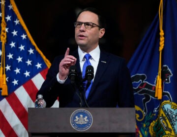 Gov. Josh Shapiro speaking at a podium