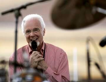 Peter Nero, leader of the Philly Pops, smiles during a sound check on a stage at the foot of the Philadelphia Museum of Art steps, Monday, July 4, 2005, in Philadelphia, as he and other artists prepare to give a free concert with Elton John to celebrate America's Independence and to raise awareness of HIV/AIDS.