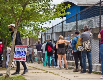 Voters wait in line outside a polling place in Philadelphia.