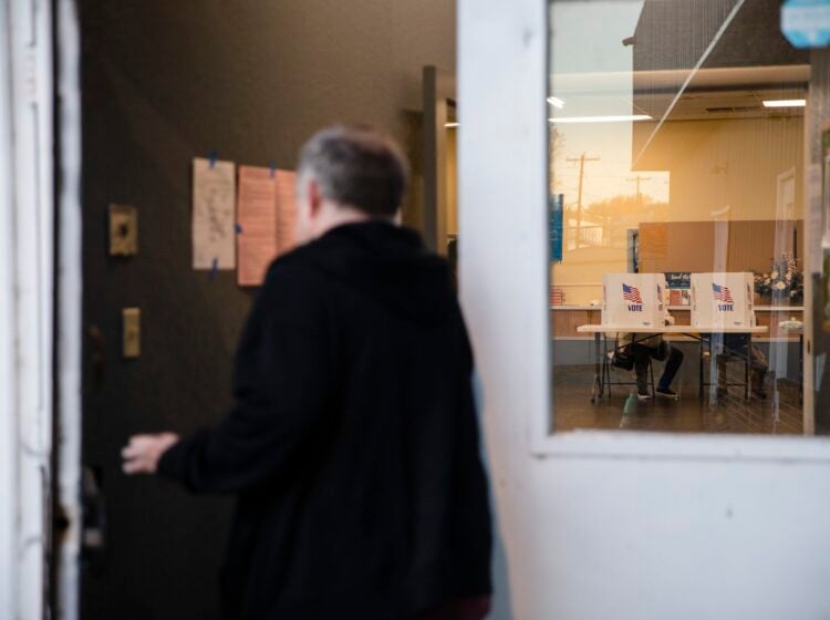 Voter entering a polling place