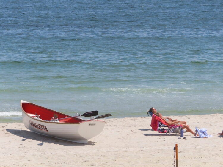 People relaxing on the beach.