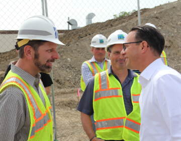 Josh Shapiro speaking with construction workers