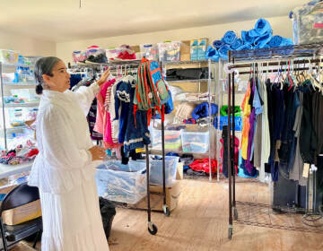 Dana Ellis, a volunteer, at the Shepherd's Office. (Johnny Perez-Gonzalez/WHYY)