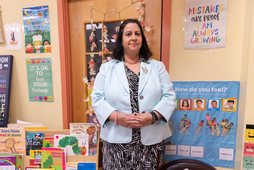 Silvia Abbato posing in a classroom