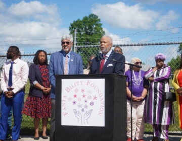 State Sens. Tim Kearney and Anthony H. Williams speaking at a podium