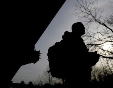 A physician assistant checks a vacant homeless camp in an attempt to provide medical care.