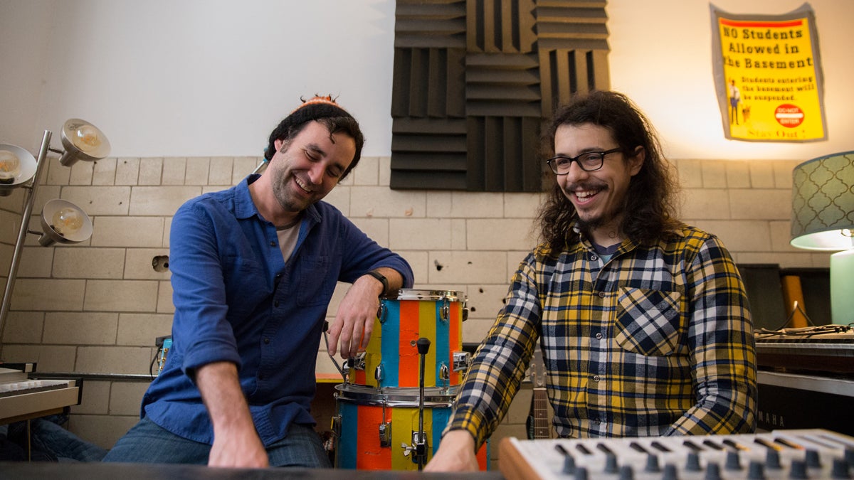 Tony Trov and Mike Vivas at their studio, Writtenhouse Records, in the basement of a former south Philadelphia high school. (Lindsay Lazarski/WHYY)  