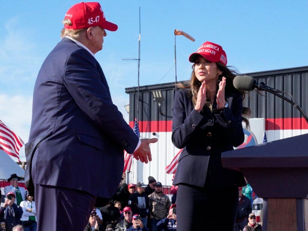 Donald Trump and Kristi Noem